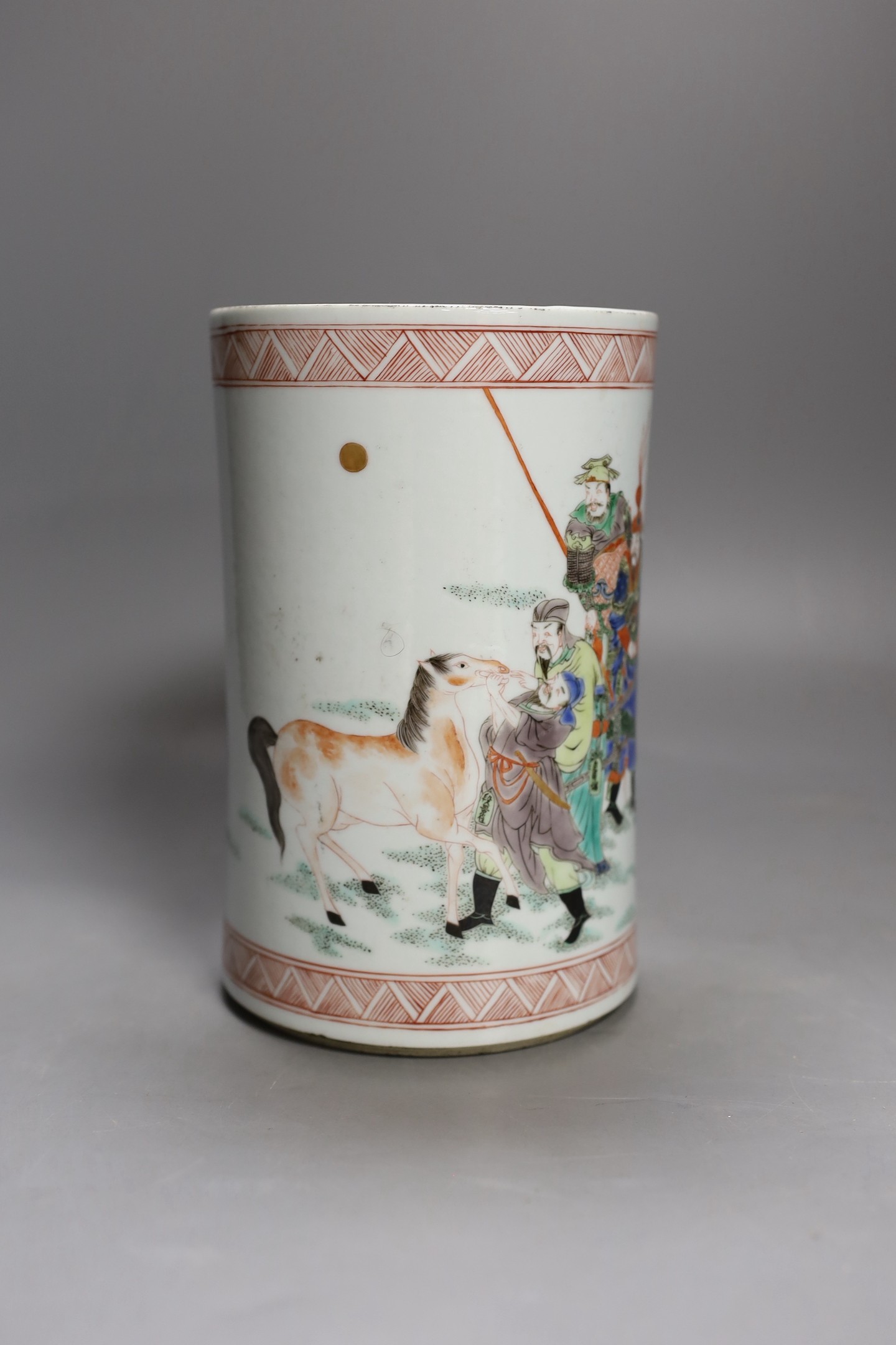 A Chinese famille verte brush pot, 19.5 cms high.